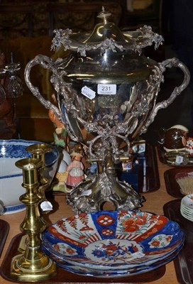 Lot 231 - A pair of brass candlesticks, two Imari plates (a.f.) and a silver plated tea urn