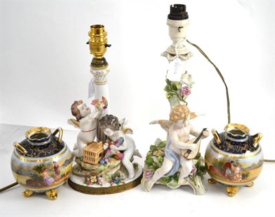 Lot 235 - A pair of Continental figural lamps and a pair of Vienna type vases (4)