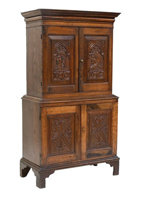 Lot 486 - A Carved Oak Four-Door Cupboard, 18th century,...