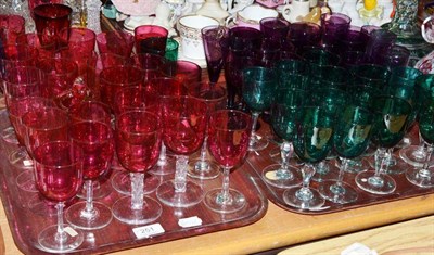 Lot 251 - Two trays of assorted late 19th century cranberry, amethyst and green drinking glasses