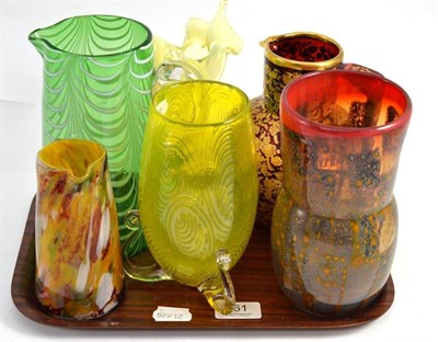 Lot 261 - A modern art glass vase, a yellow glass patterned vase on tripod base, a spill vase and three jugs