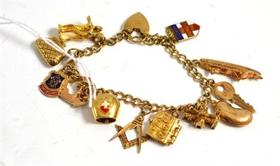 Lot 283 - A 9ct gold curb and lock bracelet hung with twelve charms