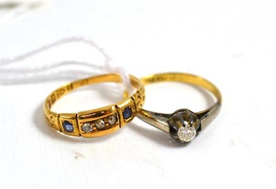 Lot 289 - An 18ct gold, diamond and sapphire set ring and a diamond solitaire ring