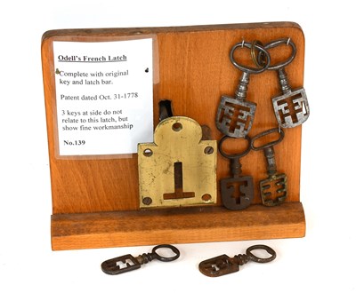 Lot 144 - An Odell's French Brass Latch, patent dated...