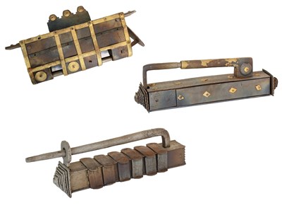 Lot 165 - Three Middle Eastern Brass and Iron Decorative...