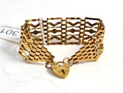 Lot 301 - A 9ct gold gate bracelet