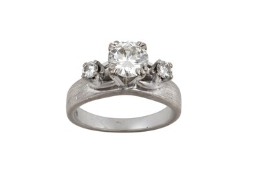 Lot 2111 - A Diamond Three Stone Ring the raised...