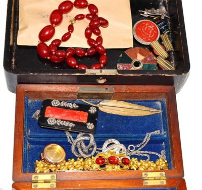 Lot 315 - A box of jewellery including amber beads, a gem set necklace, jet, hardstone set pieces and...