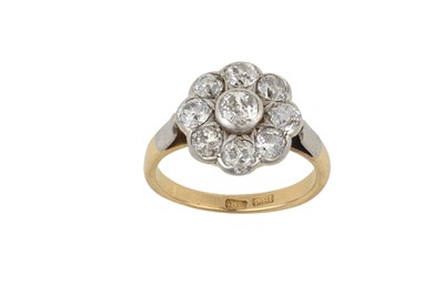 Lot 2038 - A Diamond Cluster Ring the central raised old...