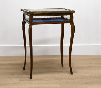 Lot 666 - A French Mahogany and Gilt-Metal-Mounted...