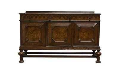 Lot 583 - An Early 20th Century Carved Oak and Walnut...
