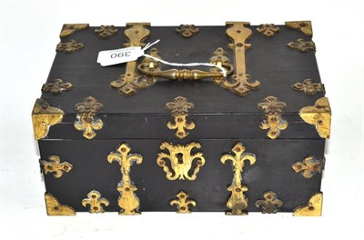 Lot 390 - A 19th century ebony and brass bound casket