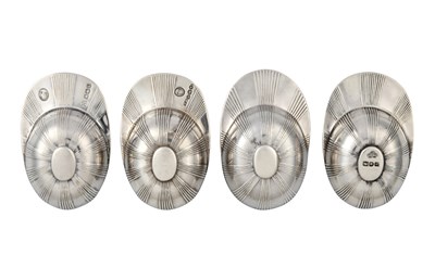 Lot 44 - Four George V and Later Silver Caddy-Spoons,...