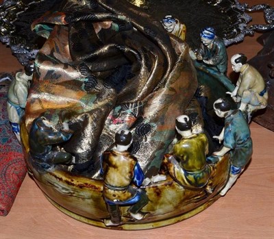 Lot 405 - An early 20th century Japanese bowl decorated with ten figures seated on the rim (a.f.) and a...