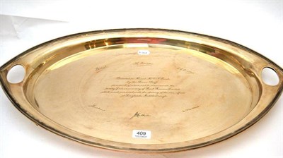 Lot 409 - A silver twin handled tray with presentation inscription