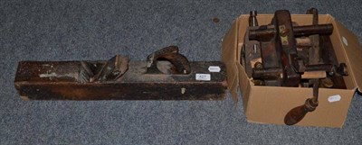 Lot 427 - Woodworking tools including a steel smoother with walnut infill and handle, plough plane,...