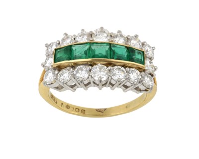 Lot 2036 - An 18 Carat Gold Emerald and Diamond Cluster...