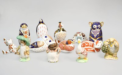 Lot 114 - Nine Royal Crown Derby Porcelain Paperweights,...
