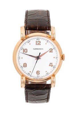 Lot 2165 - Longines: An 18 Carat Gold Centre Seconds...