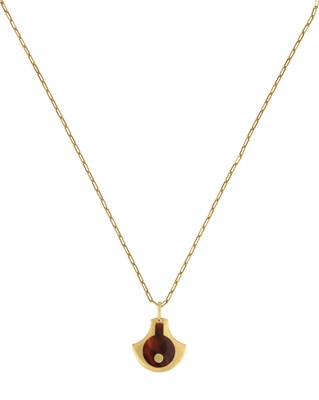 Lot 2059 - An 18 Carat Gold Tortoiseshell Pendant on...