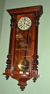 Lot 486 - Walnut Vienna wall clock, weights, key and pendulum