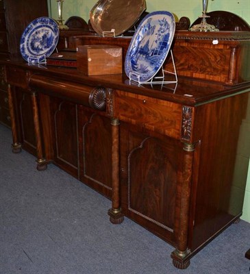 Lot 488 - An impressive mahogany sideboard, circa 1830, with superstructure and column supports above...