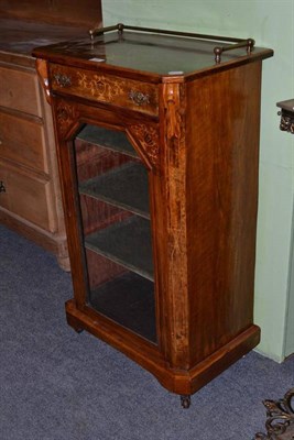 Lot 492 - A Victorian walnut music cabinet