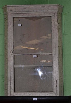 Lot 499 - A glazed corner cabinet with a cream crackle glaze paint effect