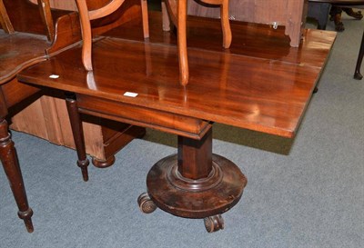 Lot 504 - A Victorian mahogany folding tea table on column base