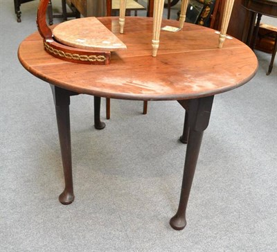 Lot 516 - An 18th century mahogany pad foot table