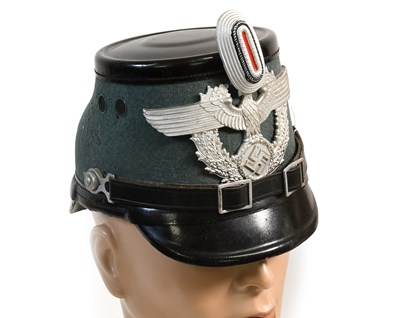 Lot 287 - A Second World War German Police NCO Shako,...
