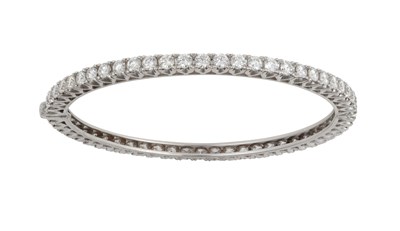 Lot 2110 - A Diamond Hinged Bangle set throughout with...