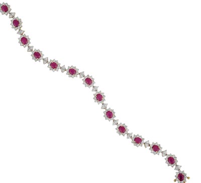 Lot 2009 - A Ruby and Diamond Bracelet fifteen clusters...