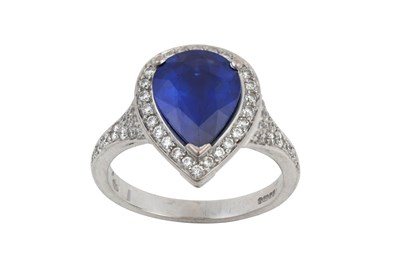 Lot 2071 - An 18 Carat Gold Sapphire and Diamond Cluster...