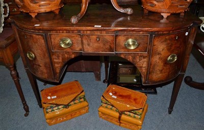 Lot 530 - A George III mahogany bowfront sideboard, early 19th century, the central frieze drawer flanked...