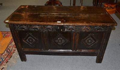 Lot 535 - A late 17th century carved oak coffer with carved panels