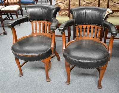 Lot 545 - A pair of late 19th century oak framed tub style open armchairs