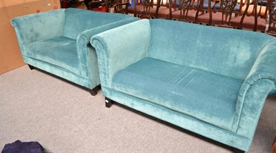 Lot 547 - A pair of modern upholstered two seater settees in teal