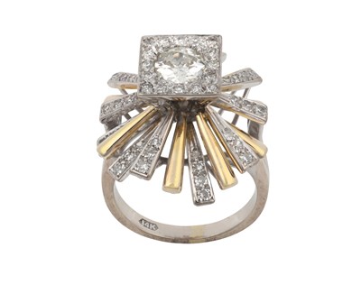 Lot 2067 - A Diamond Cluster Ring the central raised...