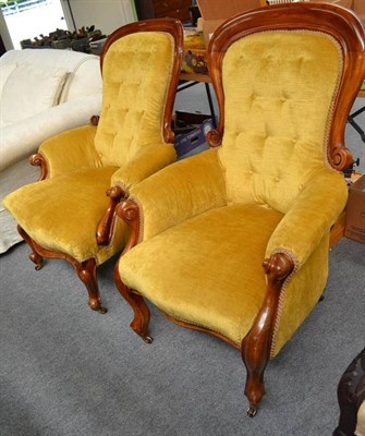 Lot 555 - A matched pair of Victorian mahogany armchairs