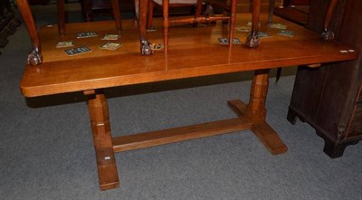 Lot 569 - A Martin ";Lizardman"; Dutton oak 5'5"; four plank refectory table, on two octagonal legs joined by