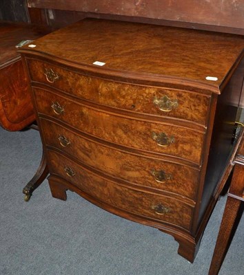 Lot 572 - Reproduction burr walnut serpentine fronted chest of drawers