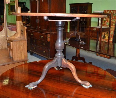 Lot 574 - A 19th century mahogany circular top occasional table on later base