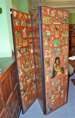 Lot 588 - A Victorian three fold screen covered with Victorian paper scraps