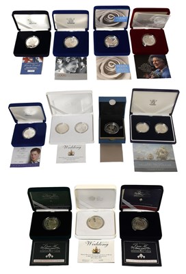 Lot 404 - Royal Mint, Assorted Silver Proof Five Pound...
