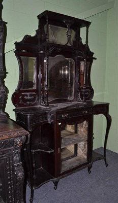 Lot 598 - An Edwardian glazed and mirror back display cabinet