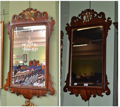 Lot 601 - Two mahogany Georgian fret cut mirrors