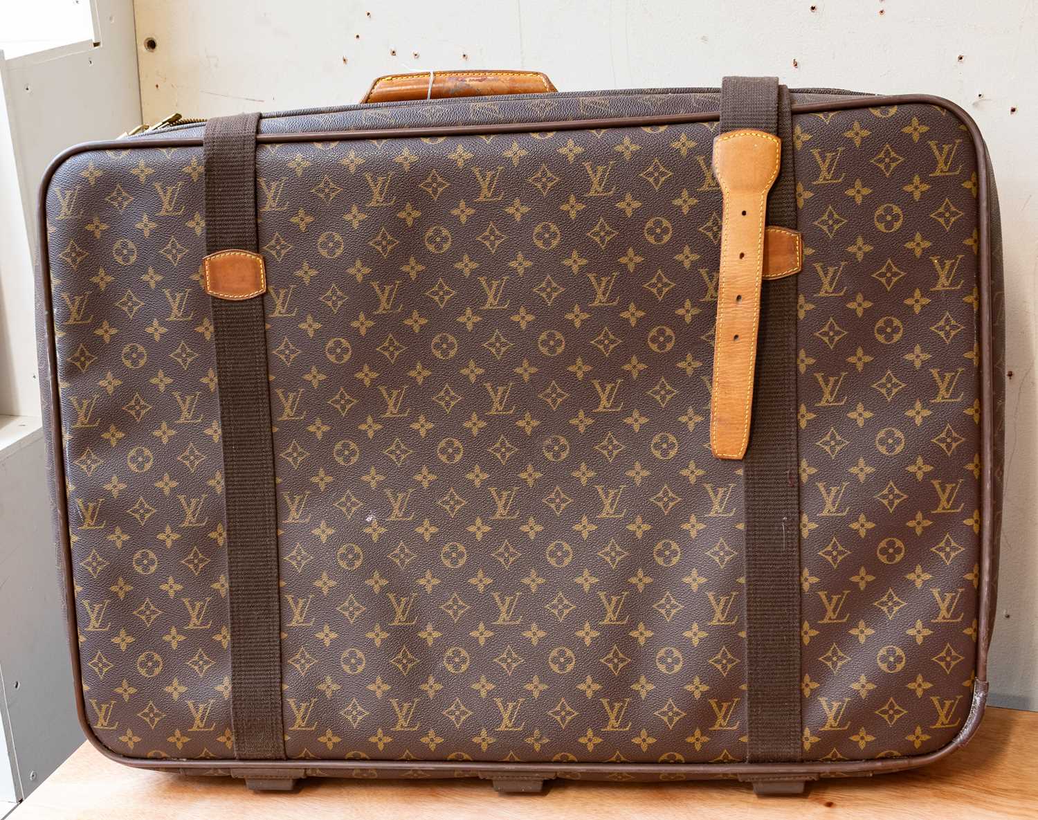 Lot 1024 - A Louis Vuitton Monogram Satellite 70 Suitcase,...