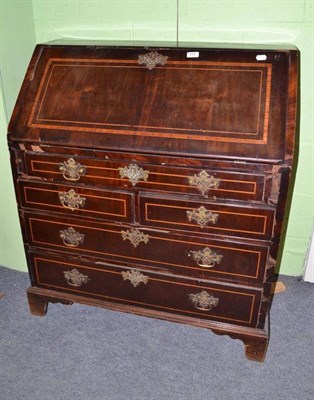 Lot 604 - A Georgian mahogany inlaid bureau (a.f.)