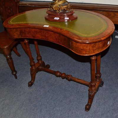 Lot 608 - A Victorian burr walnut kidney shaped writing table